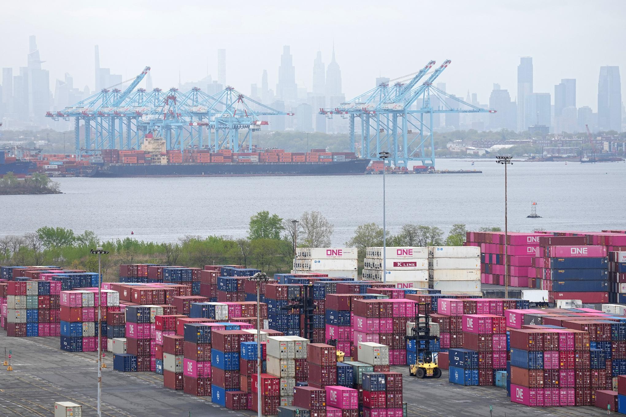 FILE - Shipping containers in the Staten Island borough of New York are seen below the shipping terminal in Elizabeth, N.J. April 22, 2026. (AP Photo/Matt Rourke, File)