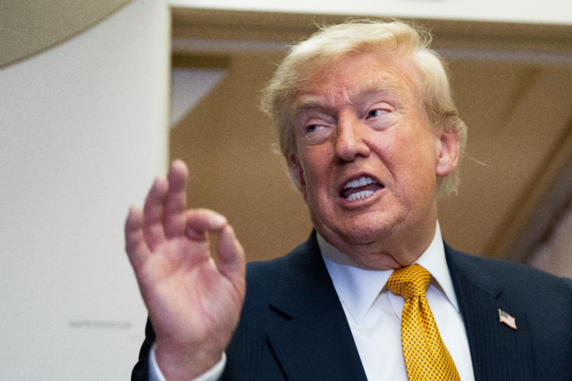 President Donald Trump speaks with reporters in flight on Air Force One after landing at U.S. Air Force Base at RAF Mildenhall, in Suffolk Eastern England, Wednesday, July 8, 2026. (AP Photo/Alex Brandon)