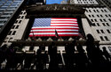 People walk past the New York Stock Exchange on Wednesday, June 29, 2022 in New York. Stocks shifted between gains and losses on Wall Street Wednesday, keeping the market on track for its fourth monthly loss this year.
(AP Photo/Julia Nikhinson)