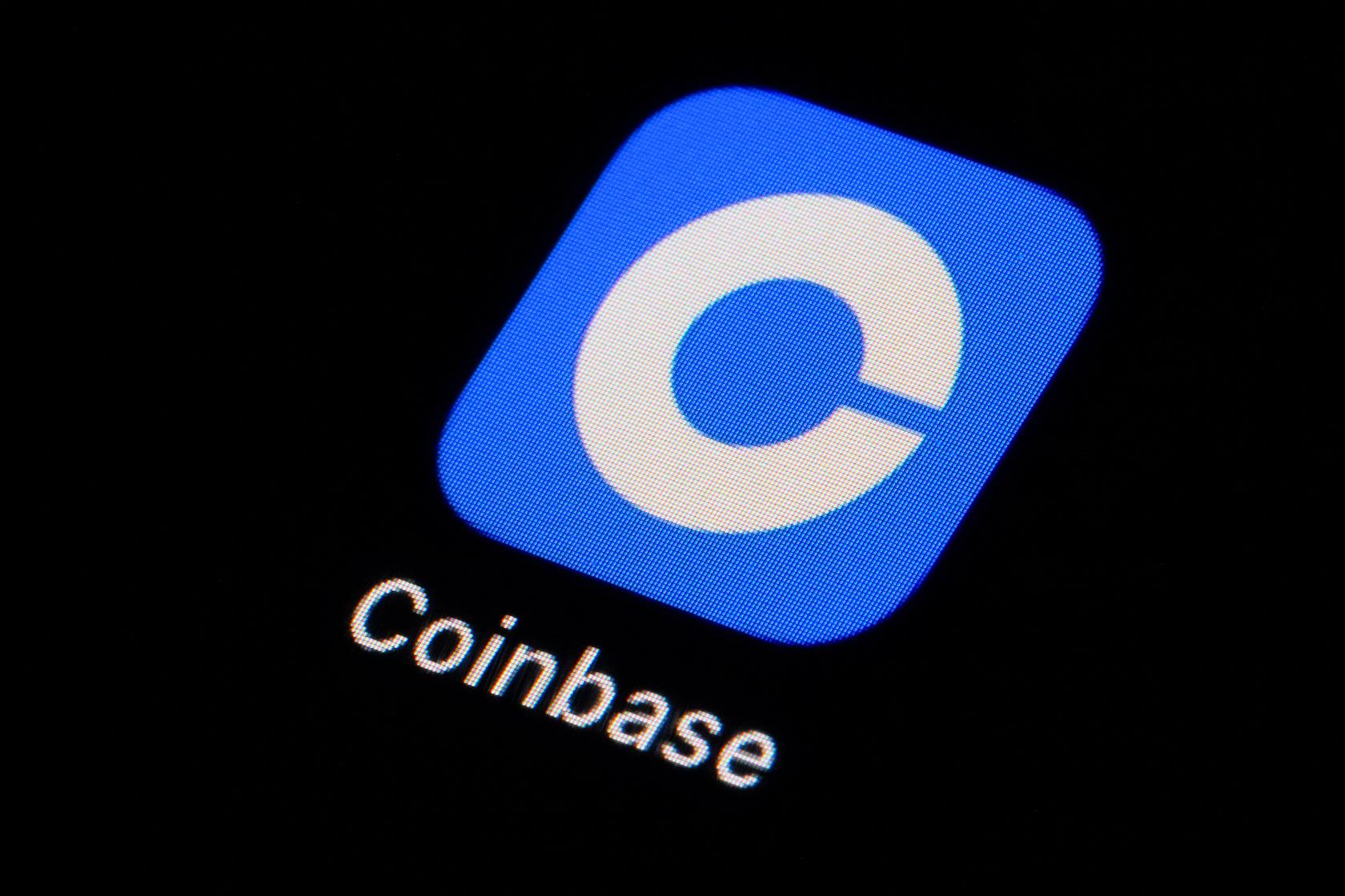 FILE - The Coinbase app icon is seen on a smartphone, Feb. 28, 2023, in Marple Township, Pa. (AP Photo/Matt Slocum, File)