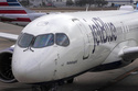 FILE - A Jet Blue Airlines jet pushes back from a gate at the Pittsburgh International Airport in Imperial, Pa., Feb. 13, 2026. (AP Photo/Gene J. Puskar, File)