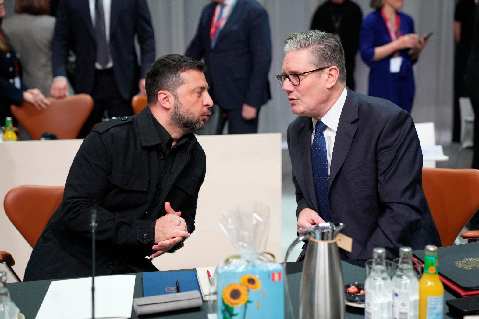 Britain's Prime Minister Kier Starmer, right, talks to Ukraine's President Volodymyr Zelenskyy, left , prior to a meeting of the European Political Community (EPC) in Copenhagen, Denmark, Thursday, Oct. 2, 2025. (Ida Marie Odgaard/Ritzau Scanpix via AP)