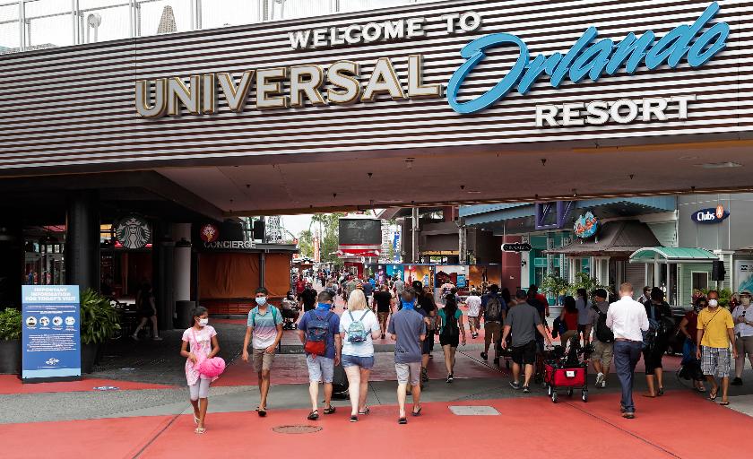 FILE - Visitors arrive at Universal Studios, June 3, 2020, in Orlando, Fla. The Universal Orlando Resort theme park in Florida plans to open a new land next year based on characters from DreamWorks Animation, company officials said Thursday, July 20, 2023. (AP Photo/John Raoux, File)