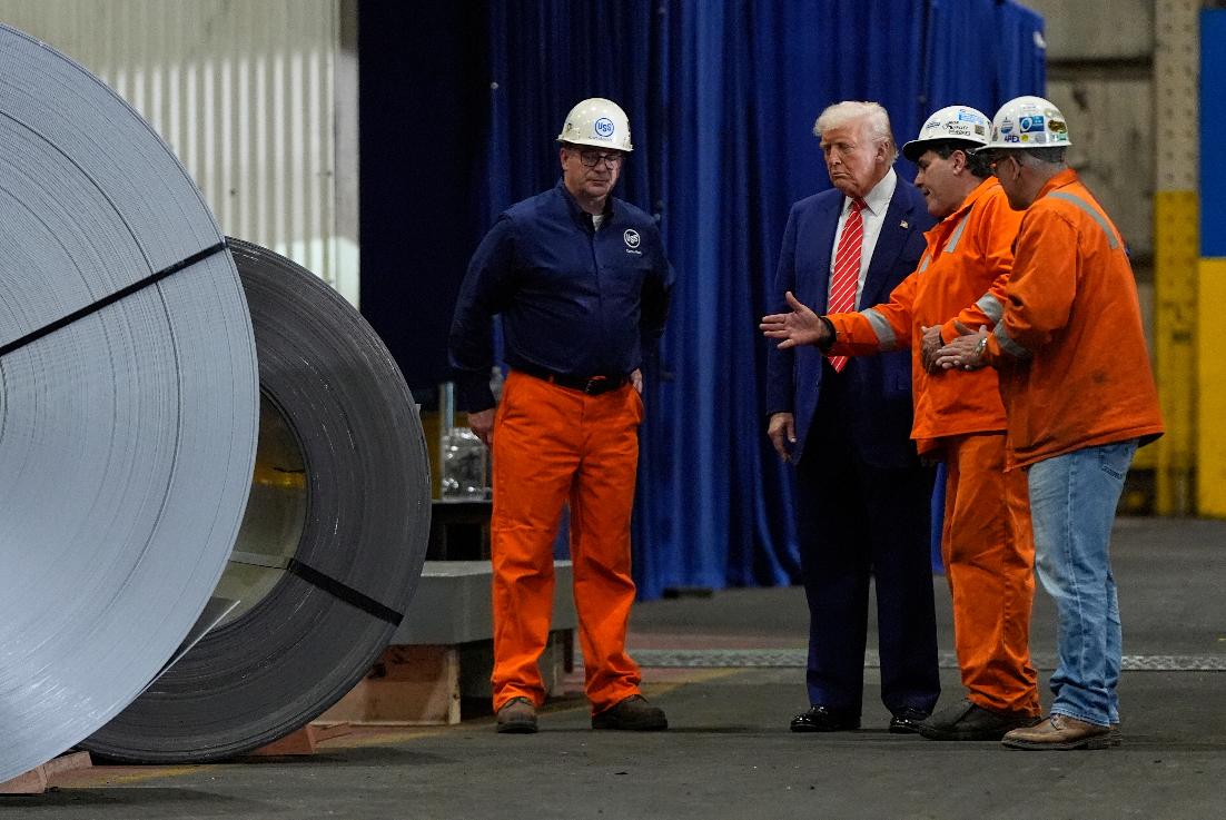 President Donald Trump talks to workers as he tours U.S. Steel Corporation's Mon Valley Works-Irvin plant, Friday, May 30, 2025, in West Mifflin, Pa. (AP Photo/Julia Demaree Nikhinson)