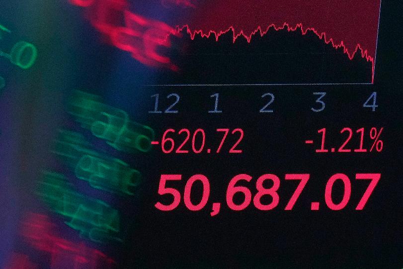 A board above the trading floor of the New York Stock Exchange displays the closing number for the Dow Jones industrial average, Wednesday, June 3, 2026. (AP Photo/Richard Drew)