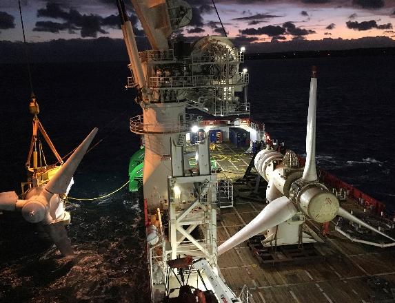 In this October 2018 photo provided by MeyGen, tidal turbines are visible at the MeyGen tidal site located in the Inner Sound of the Pentland Firth, a narrow channel of water between the Scottish mainland and Stroma Island. (Fraser Johnson/MeyGen, via AP)