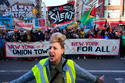 Demonstrators march during a May Day rally in New York, Friday, May 1, 2026. (AP Photo/Yuki Iwamura)