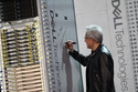 CEO of NVIDIA Jensen Huang signs a DELL machine at Dell Technologies World event happing in Las Vegas on Monday, May 18, 2026 (AP Phot/Ty ONeil)