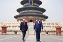 President Donald Trump, left, walks with Chinese President Xi Jinping at the Temple of Heaven on Thursday May 14, 2026, in Beijing. (AP Photo/Mark Schiefelbein)