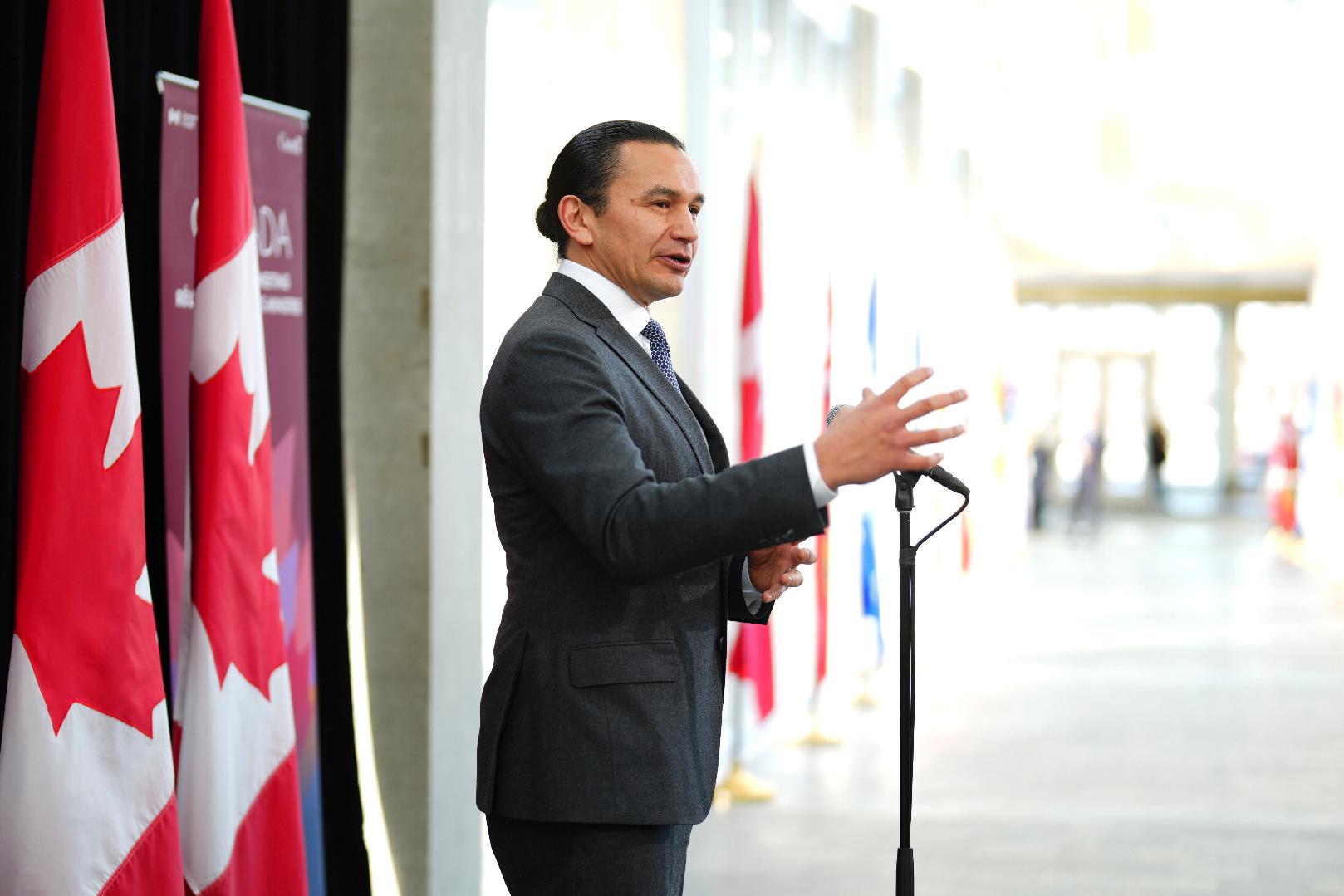 FILE - Manitoba Premier Wab Kinew talks to media as he arrives for a first ministers meeting in Ottawa on Jan.15, 2025. (Sean Kilpatrick/The Canadian Press via AP, File)