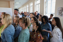 People wait in line at a polling station for an early parliamentary election, the third in 18 months, in the northern Serb-dominated part of ethnically divided town of Mitrovica, Kosovo, Sunday, June 7, 2026. (AP Photo/Dejan Simicevic)