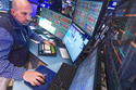 Specialist James Denaro works at his post on the floor of the New York Stock Exchange, Tuesday, May 5, 2026. (AP Photo/Richard Drew)