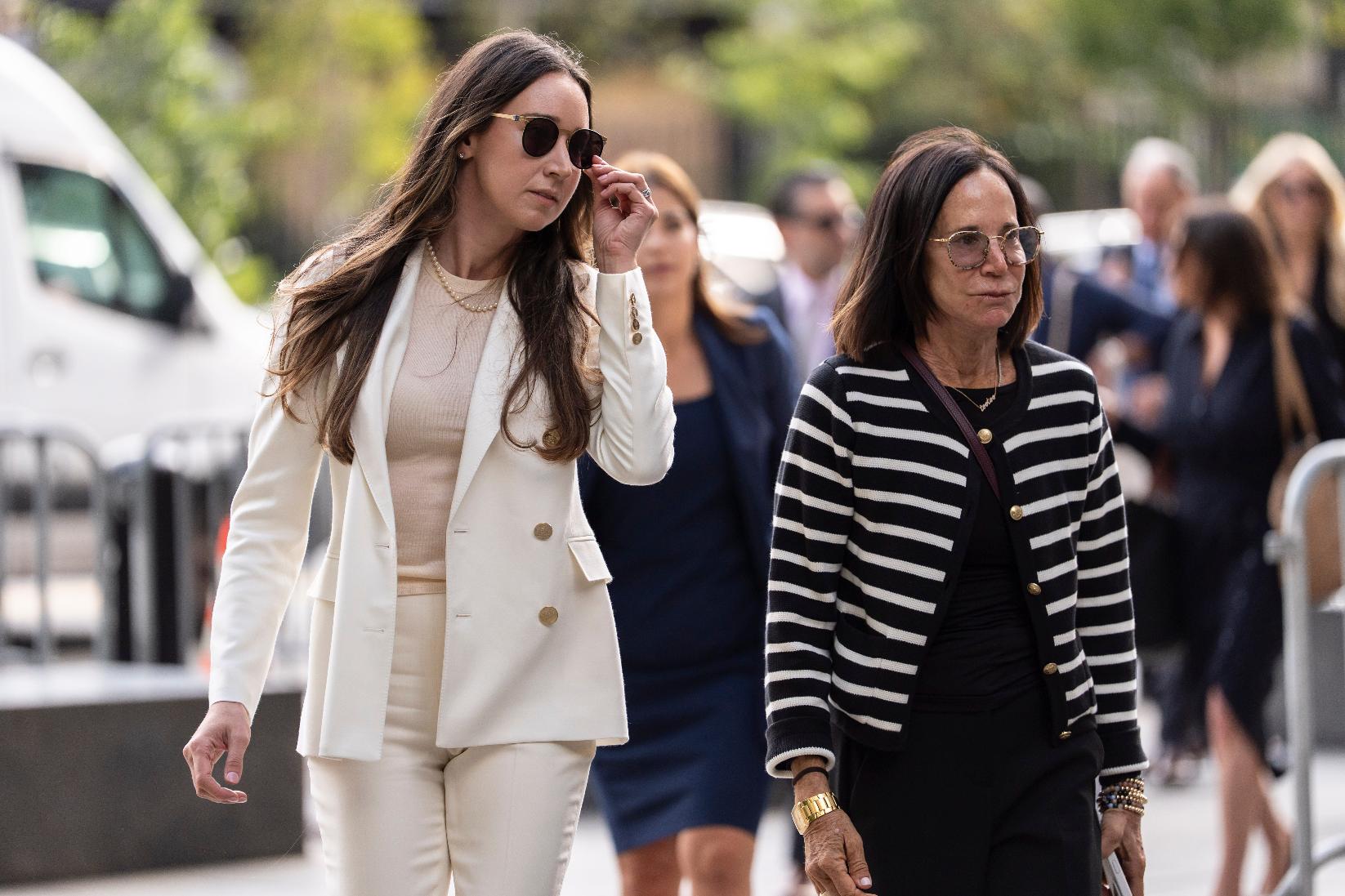 Charlie Javice, left, arrives at Manhattan federal court, Monday, Sept. 29, 2025, in New York. (AP Photo/Yuki Iwamura)