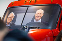 Portraits of Berkshire Hathaway's Warren Buffett, left, and CEO Greg Abel sit in a semi truck at the Pilot display in the Berkshire Hathaway annual meeting on Saturday, May 2, 2026, in Omaha, Neb. (AP Photo/Rebecca S. Gratz)