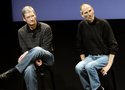 FILE - This July 16, 2010 photo shows Apple's Tim Cook, left, and Steve Jobs, right, during a meeting at Apple in Cupertino, Calif. (AP Photo/Paul Sakuma, File)