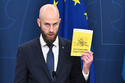 FILE - Sweden's Minister for Civil Defence Carl-Oskar Bohlin presents the new version of the booklet, "If Crisis or War Comes," in Stockholm, Sweden, Oct. 8, 2024. (Claudio Bresciani/TT News Agency via AP, File)