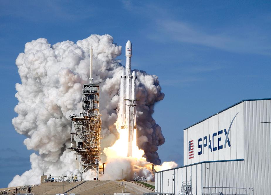 FILE - A Falcon 9 SpaceX heavy rocket lifts off from pad 39A at the Kennedy Space Center in Cape Canaveral, Fla., Tuesday, Feb. 6, 2018. (AP Photo/John Raoux, File)
