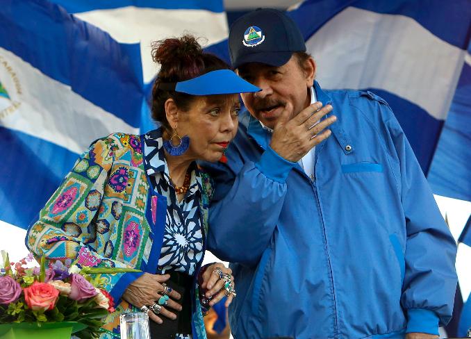 FILE - Nicaragua's President Daniel Ortega and his wife and Vice President Rosario Murillo lead a rally in Managua, Sept. 5, 2018. (AP Photo/Alfredo Zuniga, File)