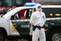 A Civil Guard border police stands guard following the arrival of hantavirus-stricken cruise ship MV Hondius at the port of Granadilla in Tenerife, Canary Islands, Spain, Sunday, May 10, 2026. (AP Photo)