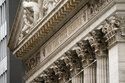 FILE - The New York Stock Exchange operates during normal business hours in the Financial District, Wednesday, Oct. 13, 2021, in New York. Stocks are moving tentatively higher in early trading on Wall Street Friday, Dec. 3, as traders struggle to parse data from a report on the U.S. job market. (AP Photo/John Minchillo, File)