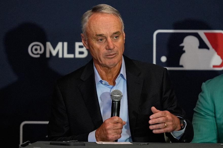 FILE - Rob Manfred, commissioner of Major League Baseball answers questions during a news conference at the MLB winter meetings, Dec. 8, 2025, in Orlando, Fla. (AP Photo/John Raoux, file)