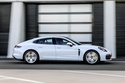 This photo provided by Porsche shows a 2020 Panamera. A plug-in hybrid version of a Panamera has less than 20 miles of all-electric range but fully delivers all of the refinement you expect of a premium luxury sedan. (Courtesy of Porsche Cars North America via AP)