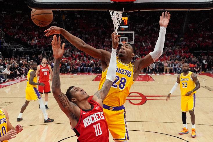 FILE - Los Angeles Lakers forward Rui Hachimura (28) blocks a shot by Houston Rockets forward Jabari Smith Jr. (10) during the first half of Game 6 of a first-round NBA playoffs basketball series in Houston, May 1, 2026. (AP Photo/Ashley Landis, File)