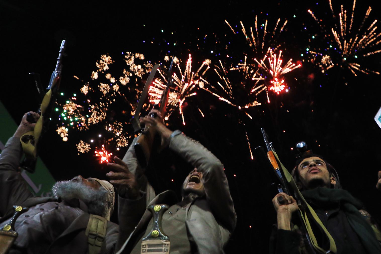 Fireworks burst as Houthi supporters rally against the Saudi-led coalition in Sanaa, Yemen, Monday, July 20, 2026. (AP Photo/Osamah Abdulrahman)