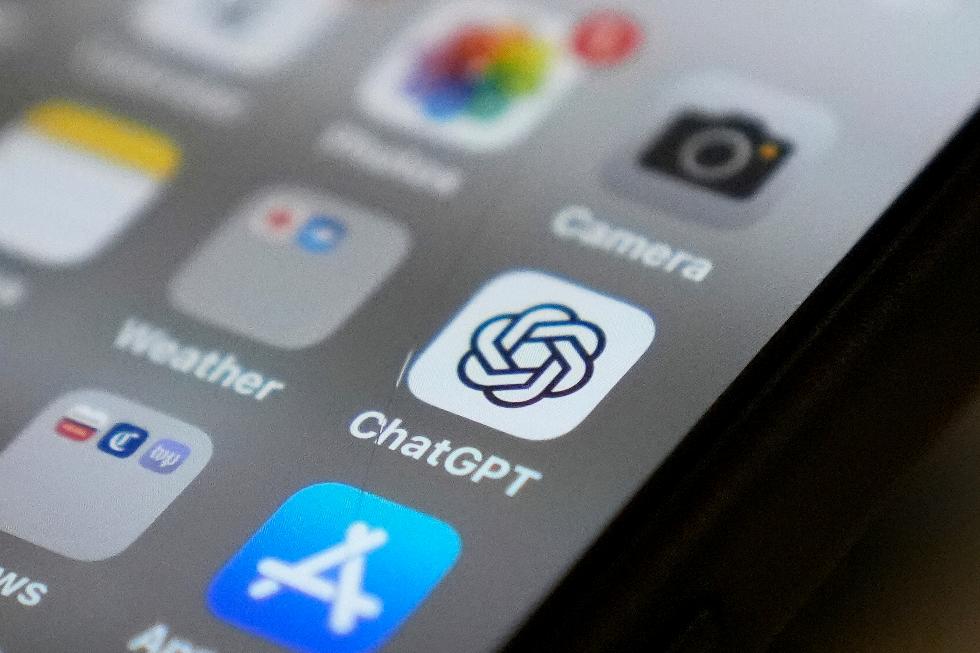 FILE - The Chat GPT app icon is seen on a smartphone screen, Aug. 4, 2025, in Chicago. (AP Photo/Kiichiro Sato, File)