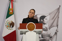 FILE - Mexican President Claudia Sheinbaum gives her the daily, morning news conference at the National Palace in Mexico City, Feb. 23, 2026. (AP Photo/Ginnette Riquelme, File)
