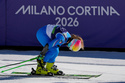 Italy's Lara Della Mea unlatches her boots at the finish area of an alpine ski, women's giant slalom race, at the 2026 Winter Olympics, in Cortina d'Ampezzo, Italy, Sunday, Feb. 15, 2026. (AP Photo/Andy Wong)
