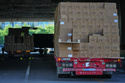 Workers transfer goods from a truck at the Xiaomi logistic center, in Beijing, China on Friday, May 29, 2026. (AP Photo/Andy Wong)
