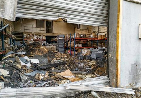 FILE - This 2024 photo provided by the Metropolitan Police shows damage to a warehouse in east London that was storing goods for Ukraine, after a fire that prosecutors said was organized on behalf of Russia's intelligence services. (London Metropolitan Police via AP, File)
