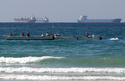 FILE - Fishermen work in front of oil tankers south of the Strait of Hormuz Jan. 19, 2012, offshore the town of Ras Al Khaimah in United Arab Emirates. (AP Photo/Kamran Jebreili, File)