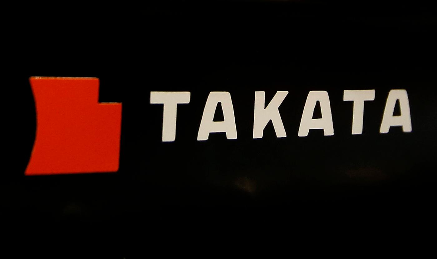 FILE - The logo of Takata Corp. is displayed at an auto supply shop in Tokyo, July 6, 2016. In a document posted Tuesday, Aug. 1, 2023, General Motors announced it is recalling nearly 900 vehicles in the U.S. and Canada with Takata air bag inflators that could explode and hurl shrapnel in a crash. (AP Photo/Shizuo Kambayashi, File)
