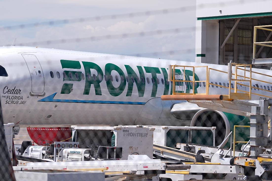 Frontier Airlines jetliner number n646fr sits outside the airlines technical operations center with other jetliners in for service north of Denver International Airport Saturday, May 9, 2026, in Denver. (AP Photo/David Zalubowski)