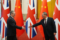 British Prime Minister Keir Starmer attends a ceremonial welcome with Chinese Premier Li Qiang ahead of their meeting at the Great Hall of the People in Beijing, Thursday, Jan. 29, 2026. (Carl Court/Pool Photo via AP)