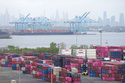 FILE - Shipping containers in the Staten Island borough of New York are seen below the shipping terminal in Elizabeth, N.J. April 22, 2026. (AP Photo/Matt Rourke, File)