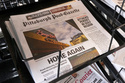 The printed edition of the Pittsburgh Post-Gazette sits in a newspaper rack, Thursday, April 2, 2026, in Pittsburgh. (AP Photo/Gene J. Puskar)