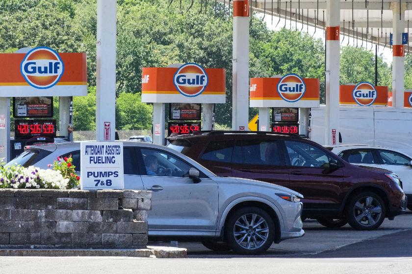 FILE - Cars line up at the pumps of a Gulf Oil station on the Massachusetts Turnpike near Boston, Sunday, July 19, 2026. (AP Photo/Gene J. Puskar, File)