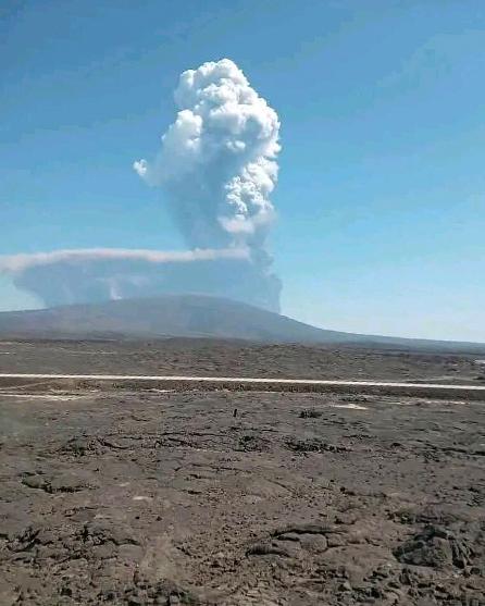CAPTION CORRECTS HISTORY OF THE VOLCANO - In this photo released by the Afar Government Communication Bureau, ash billows from an eruption of the long-dormant Hayli Gubbi Volcano in Ethiopia's Afar region, Sunday, Nov. 23, 2025. (Afar Government Communication Bureau via AP)