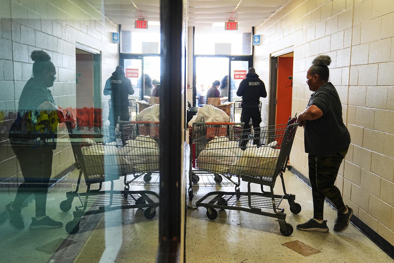 Volunteer Karen Robinson moves groceries durning an emergency food distribution at The Jewish Federation of Greater Philadelphia's Mitzvah Food Program in Philadelphia, Friday, Nov. 7, 2025. (AP Photo/Matt Rourke)