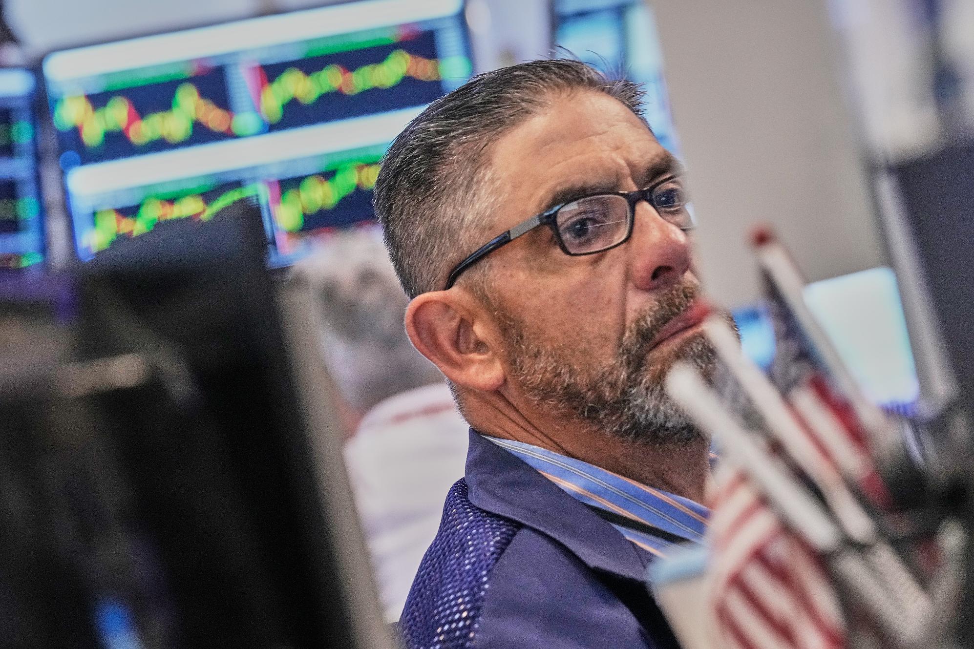 Trader Robert Oswald works on the floor of the New York Stock Exchange, Thursday, June 25, 2026. (AP Photo/Richard Drew)