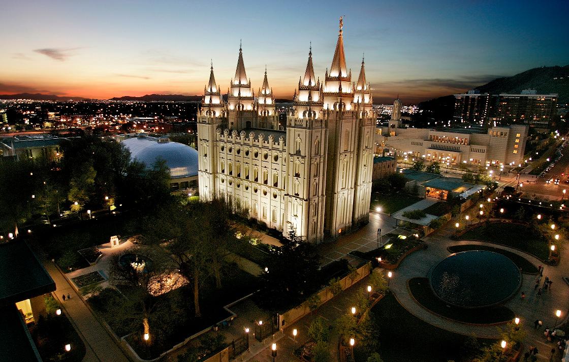 FILE - The sun sets behind the Mormon Temple, the centerpiece of Temple Square, in Salt Lake City, April 27, 2006. (AP Photo/Douglas C. Pizac, File)