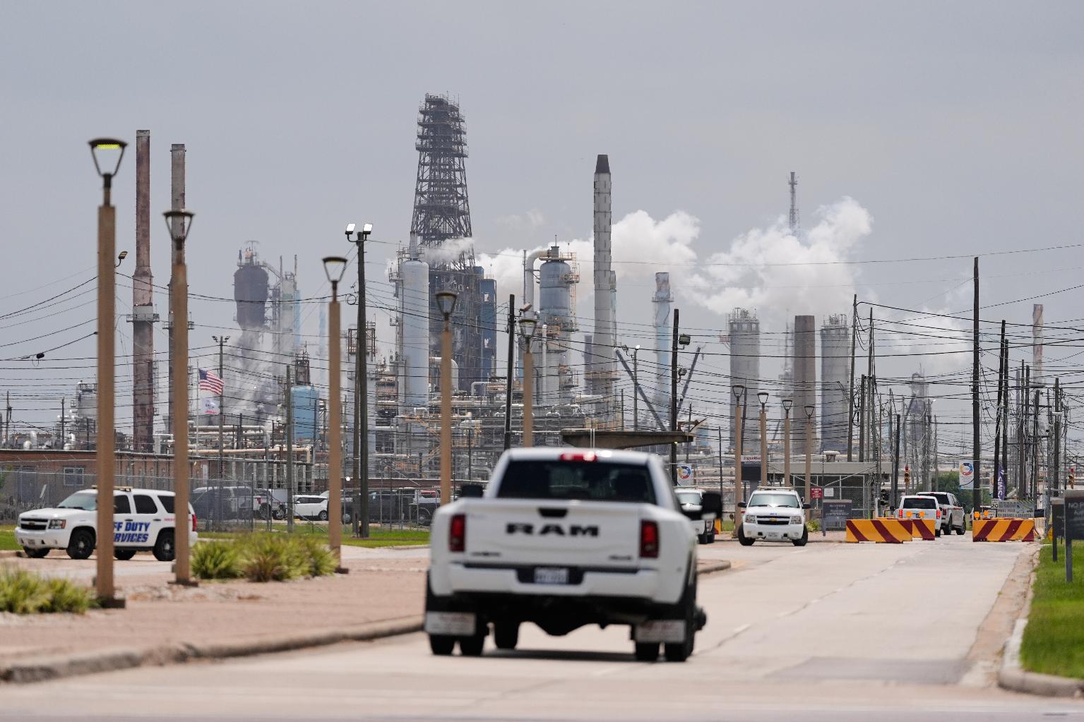 FILE- A truck enters the Exxon Mobil Baytown Olefins Plant, Wednesday, April 29, 2026, in Baytown, Texas. (AP Photo/Ashley Landis, File)