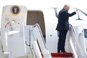 President Donald Trump gestures as he boards Air Force One, Friday, May 1, 2026, at Joint Base Andrews, Md. (AP Photo/Luis M. Alvarez)