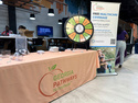 FILE - A stand for Georgia Pathways is seen at a job fair in Atlanta, Ga., June 5, 2025. (AP Photo/Sudhin Thanawala, File)