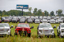 The Chevrolet Silverados and GMC Sierra pickups built at Flint Assembly are packed on Sept. 21, 2021. For the first time in eight months, the global shortage of computer chips won’t force General Motors to close any North American factories. The company says Friday, Oct. 22, that as of Nov. 1, all plants that had been closed on and off since February due to the shortage will be making vehicles. The shortage has forced automakers to sporadically shut down plants since late last year. (Jake May/The Flint Journal via AP)