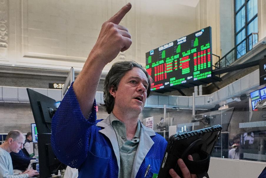Options trader Doran Swan works on the floor of the New York Stock Exchange, Tuesday, June 16, 2026. (AP Photo/Richard Drew)