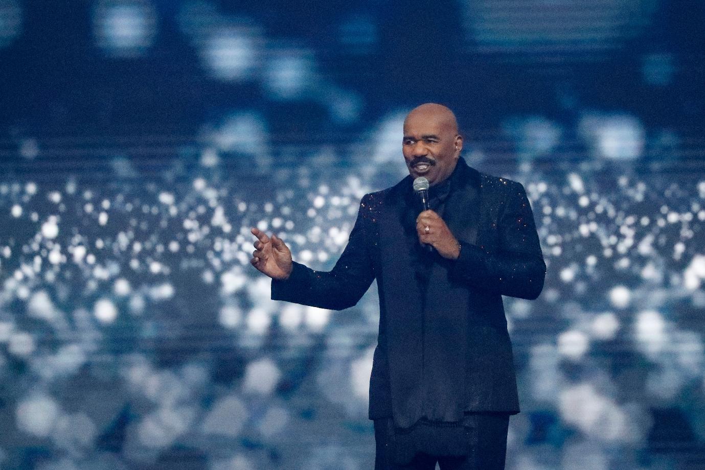 FILE - Host Steve Harvey speaks during the 70th Miss Universe pageant, Dec. 13, 2021, in Eilat, Israel. (AP Photo/Ariel Schalit, File)